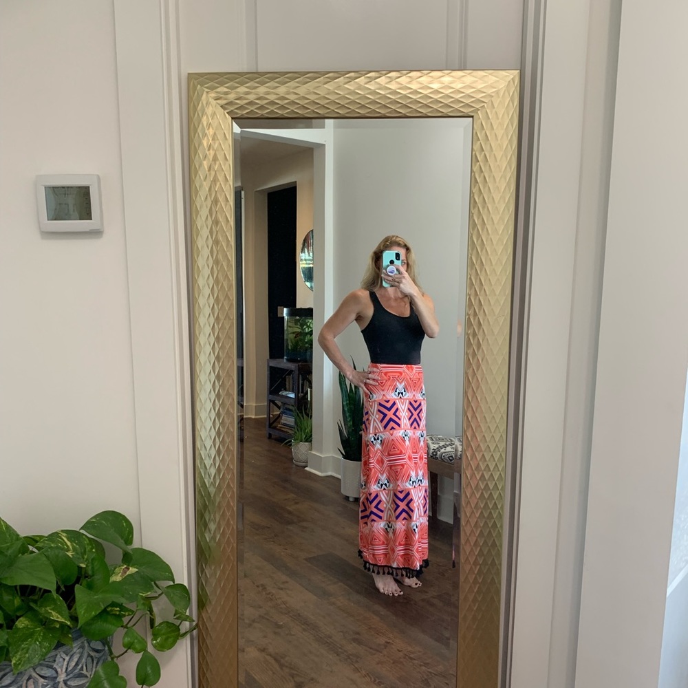 Very colorful long skirt with super cute black tassels at the bottom